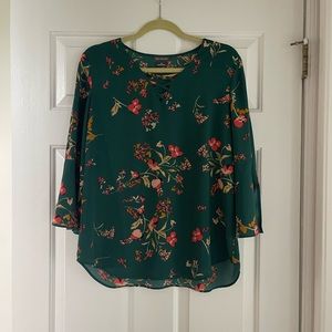 Green floral blouse